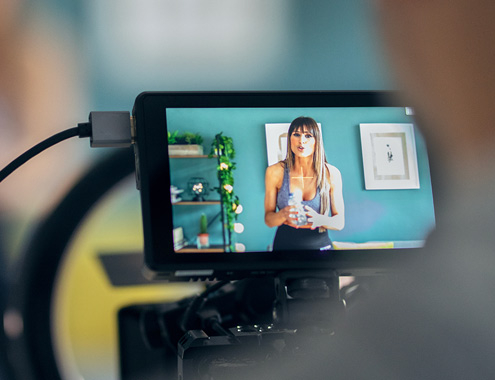 Corporate video production cost Melbourne shoot with professional crew and camera equipment